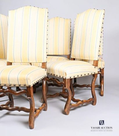 null A suite of six high back chairs, they rest on a sheep bone base joined by a...