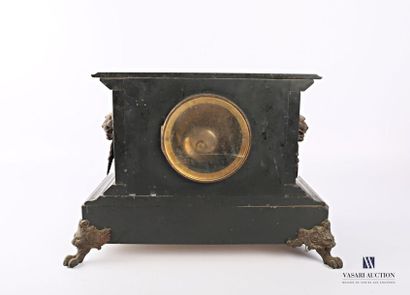 null A black granite clock with a rectangular shape, the dial is round with Roman...
