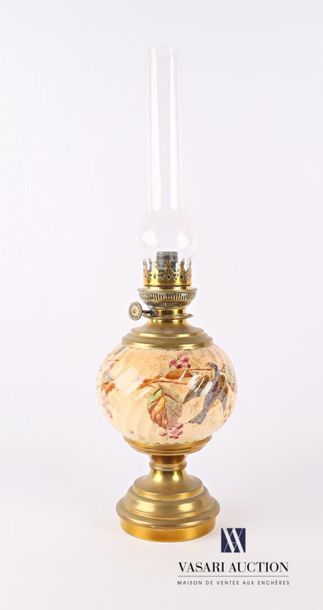 null Brass oil lamp resting on a round to soft base, the spherical body in earthenware...
