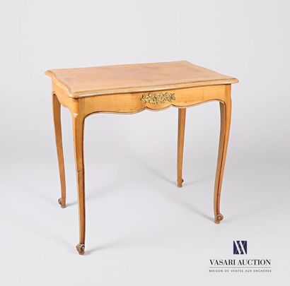 null Moulded natural wood writing table, the top with an animated border underlined...