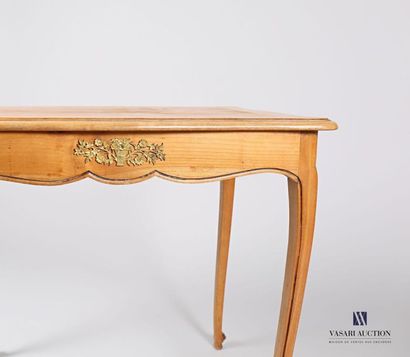 null Moulded natural wood writing table, the top with an animated border underlined...