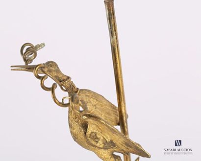 null Bronze lamp base, the shaft decorated with a heron holding two snakes in its...