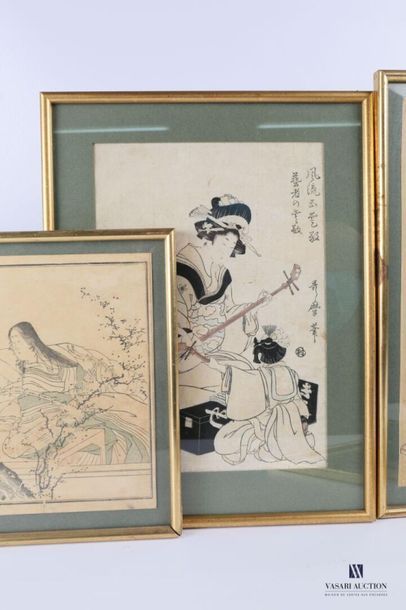 null Lot de quatre estampes japonaises encadrées figurant des scènes du quotidien...