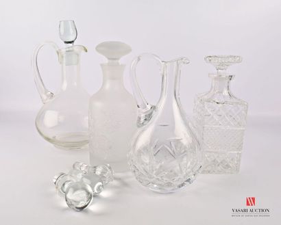 null Set of four glass and crstal decanters comprising a moulded crystal whisky carafe...