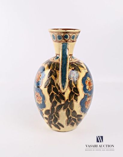 null Two-handled enamelled terracotta vase of ovoid shape with two handles decorated...