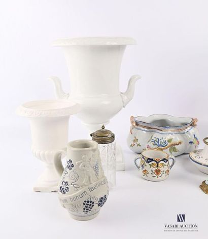 null Lot comprising a white porcelain baluster-shaped vase, the border hemmed with...
