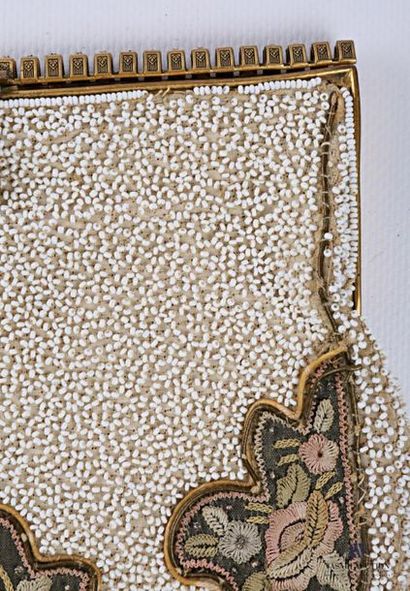 null Ball bag decorated with embroidered flower seeds and semi pearls, the bronze...