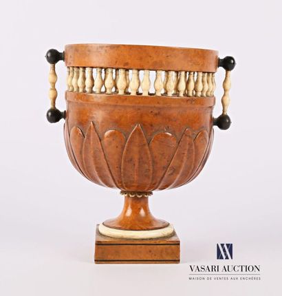 null Cut on a two-handled boxwood veneer pedestal, the edge hemmed with an openwork...