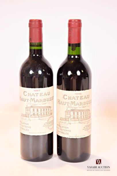 null 2 bouteilles	Château HAUT MARBUZET	St Estèphe	
	1 blle de 1998, 1 blle de 1997.		
	Et.:...