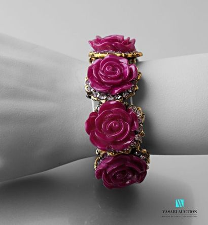 null Bracelet on elastic cord decorated with purple resin flower motifs hemmed with...