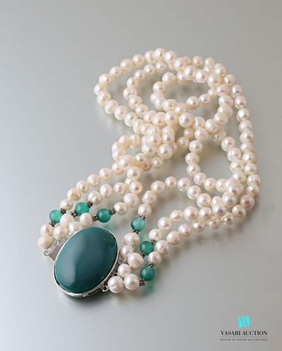 null Necklace with three rows of freshwater cultured pearls, the metal clasp adorned...