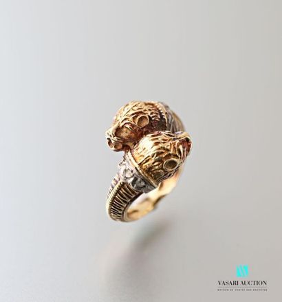 null In the taste of Lalaounis, a 750 thousandths gold cross ring with a lioness'...