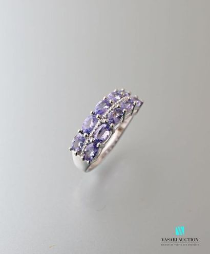 null Silver ring with two oval
tanzanite lines Gross weight : 3,52 g - Finger size...