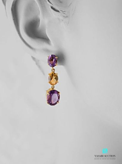 null Pair of vermeil ear pendants each adorned with two amethysts and an oval sized...