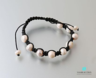 null Bracelet on black cotton decorated with white beads