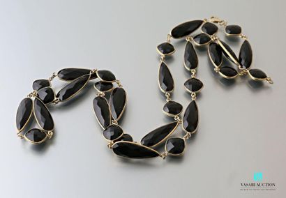 null Long necklace in vermeil decorated with onyx of piriform and rhombic size, the...