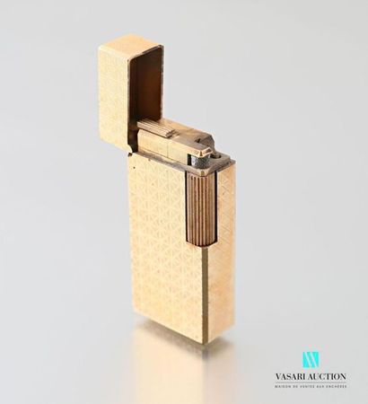 null Flaminaire brand lighter in gilded metal decorated with geometric patterns on...