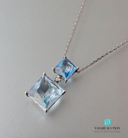 null Pendant and its chain in 750 thousandths white gold, it is set with two square-cut...