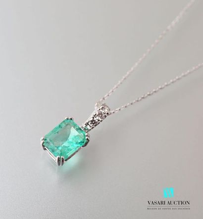 null Pendant and its chain in 750 thousandths white gold, set with an emerald-cut...