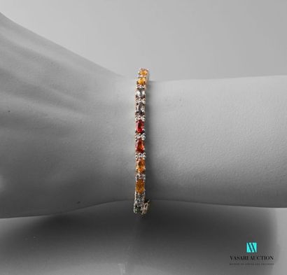 null Silver line bracelet set with multicolored sapphires, clasp snap hook Gross
weight...