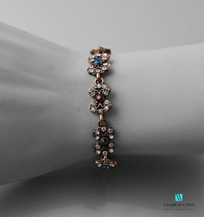 null Metal bracelet decorated with butterfly motifs embellished with fancy stones.
Length...