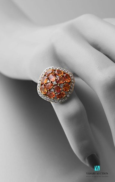 null 750 thousandths yellow gold ring set with eight orange sapphires adorned and...