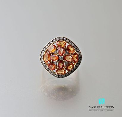 null 750 thousandths yellow gold ring set with eight orange sapphires adorned and...