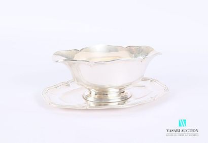 null Gravy boat and its silver frame, the contoured edges decorated with fillets.
Top....