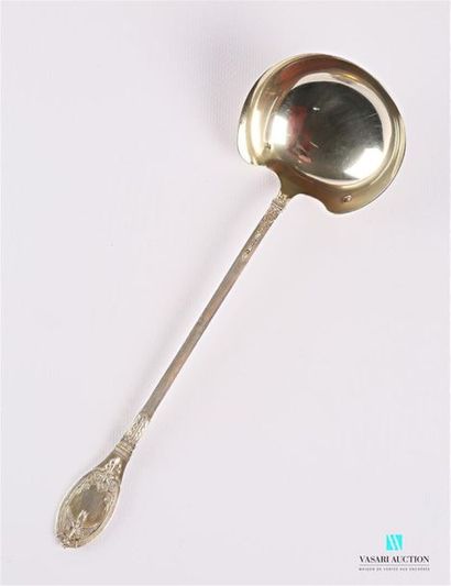 null Silver cream ladle, the handle decorated with a flaming and winged torch, palmettes...
