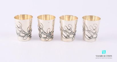 null A suite of four truncated cone-shaped silver liqueur glasses with a mistletoe...