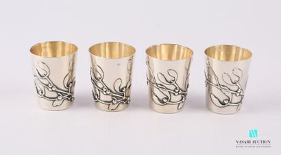 null A suite of four truncated cone-shaped silver liqueur glasses with a mistletoe...