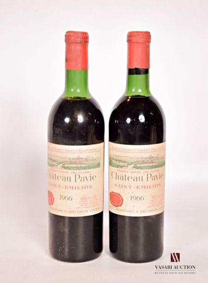 null 2 bouteilles	Château PAVIE	St Emilion 1er GCC	1966
	Et. tachées. N : 1 tout...