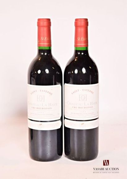 null 2 bouteilles	Château LA HAYE	St Estèphe CB	1993
	Et. à peine tachées. N : mi...