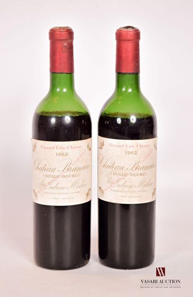 null 2 bouteilles	Château BRANAIRE DUCRU	St Julien GCC	1962
	Et. tachées. N : bas...
