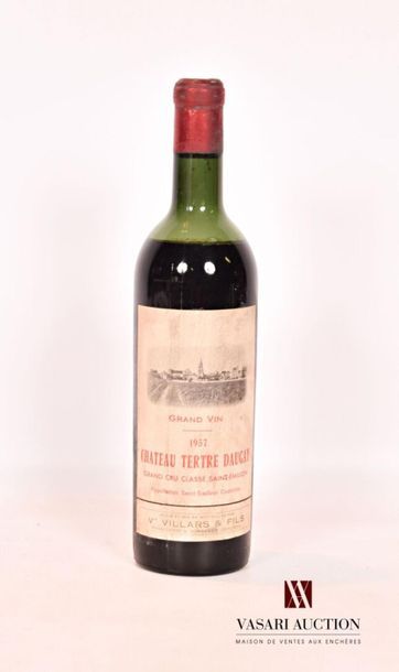 null 1 bouteille	Château TERTRE DAUGAY	St Emilion GCC	1957
	Mise nég. Et. fanée et...