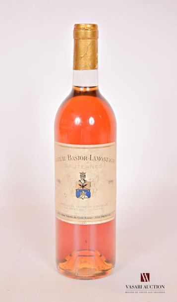 null 1 bouteille	Château BASTOR LAMONTAGNE	Sauternes	1990
	Et. tachée. N : bas g...