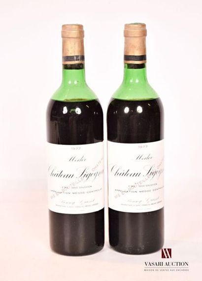 null 2 bouteilles	Château SIGOGNAC	Médoc CB	1977
	Et. excellentes. N : mi épaule...