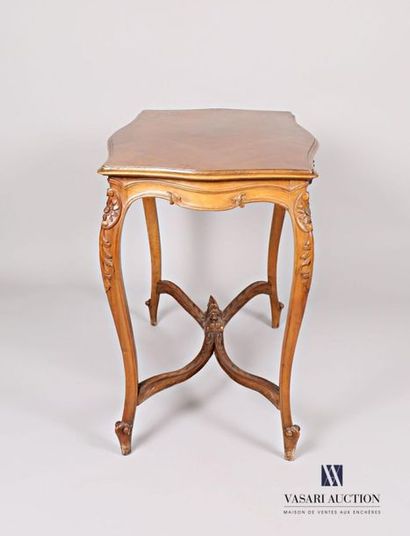 null Middle table made of moulded, carved and veneered natural wood, the top of an...