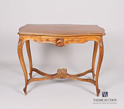 null Middle table made of moulded, carved and veneered natural wood, the top of an...