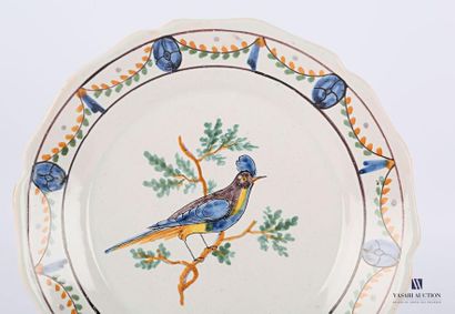 null Nevers- Late 18th century 
Earthenware plate with polychrome decoration in the...