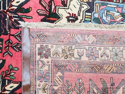 null AFSHARI - IRAN
Wool carpet decorated with twelve geometrically shaped motifs...