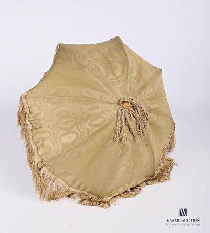 null Umbrella in anise green silk, lining in cream silk, the handle partly in wood...