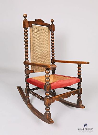 null Rocking armchair in moulded natural wood, straw back and seat, rosary uprights...