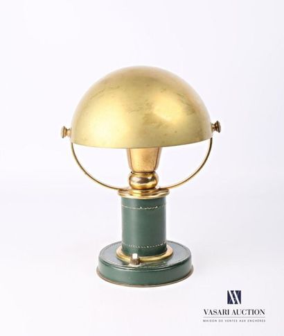 null Desk lamp in brass and quilted green leather, it rests on a round base with...