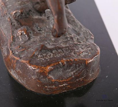 null Bronze subject with a brown patina representing a cowboy riding a horse, it...