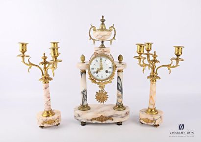 null Marble and bronze mantel set including a clock and two candelabra. The portico...