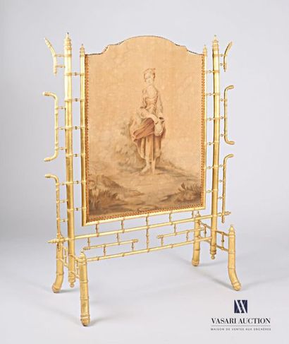 null Moulded wooden mantel screen in imitation of bamboo and gilded, it presents...