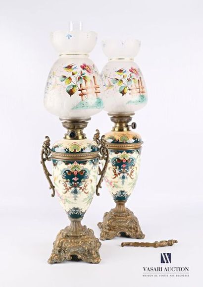 null Pair of earthenware, ruler and glass kerosene lamps, the baluster shaft with...