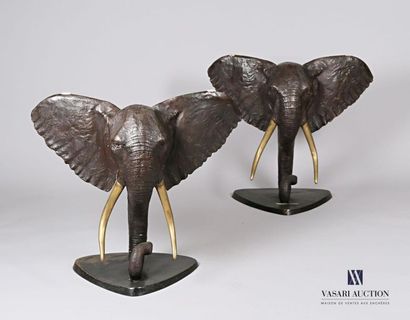 null Table, the bronze uprights with brown patina showing elephant heads, the glass...
