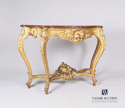 null Moulded, carved and gilded wooden console, the belt is decorated with a shell...